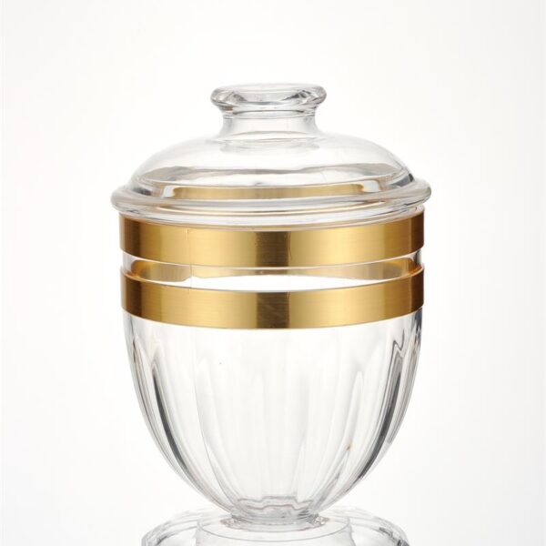 small gilded glass sealed storage jar with gold decorative finish